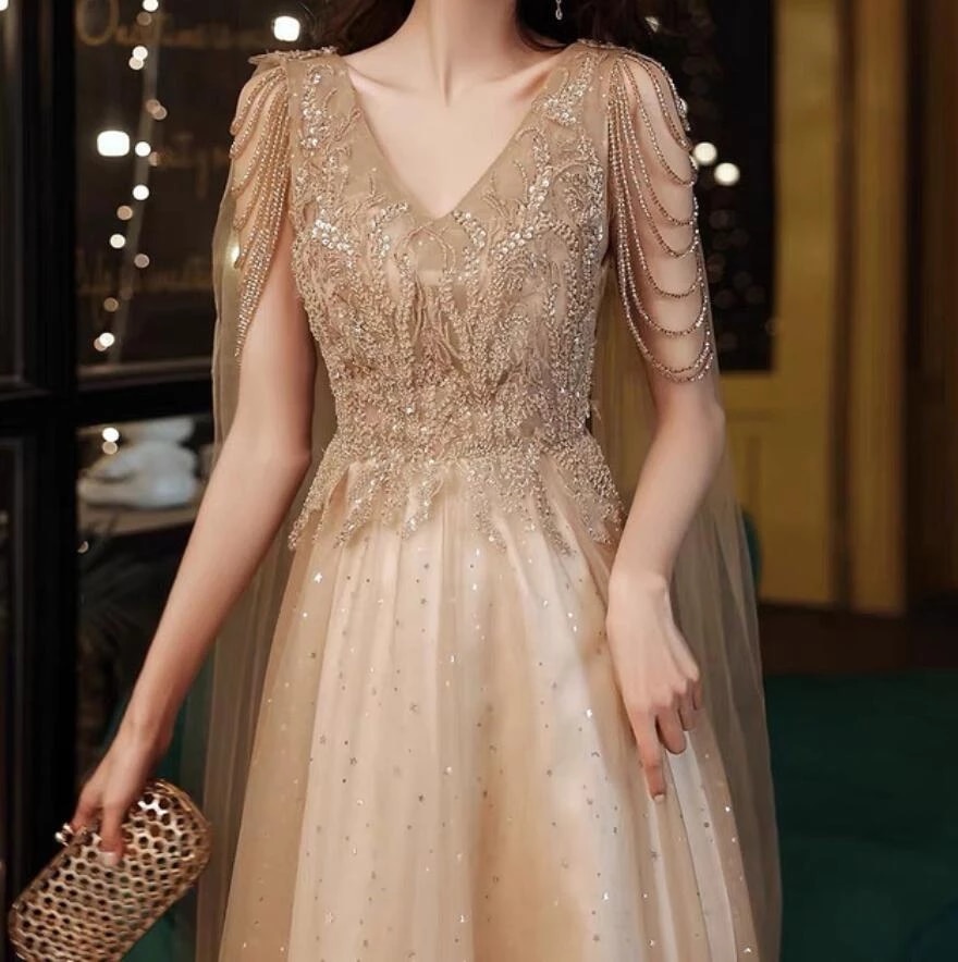 2022 Champagne Gold Evening Dresses With Cape A Line Sexy V-neck A-line Shiny Luxury Beading Shawl Formal Celebrity Prom Gowns alx