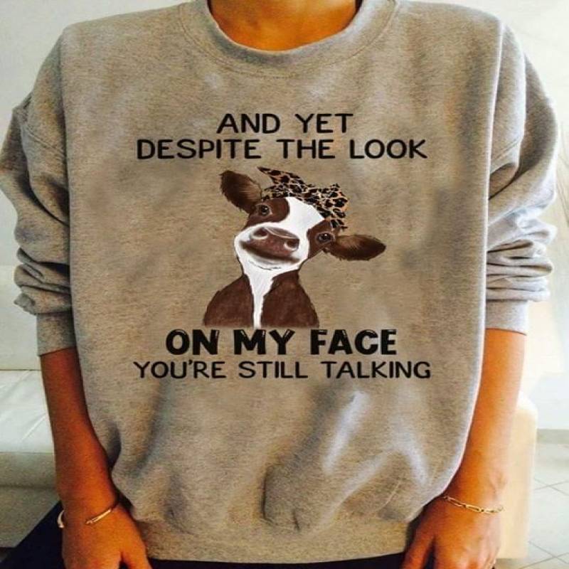 And Yet Despite The Look On My Face You’Re Still Talking Milk Cow With Leopard Fured Pattern Bow Headband Funny Gift For Sarcastic People Gray Sweatshirt S-5Xl