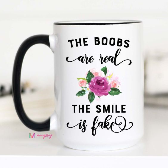 The Boobs Are Real The Smile Is Fake mug