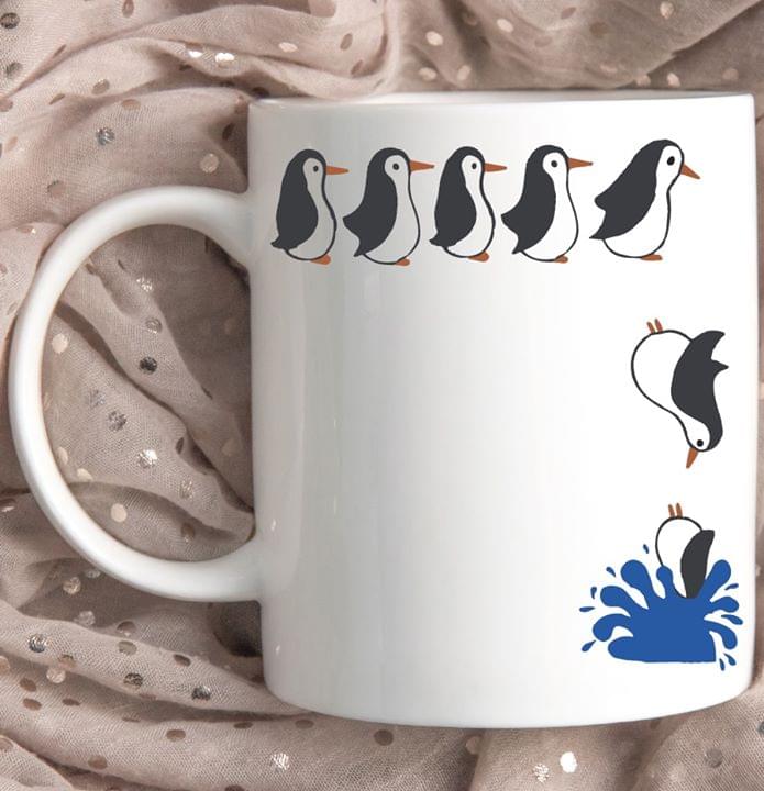 Jumping Penguins Mug