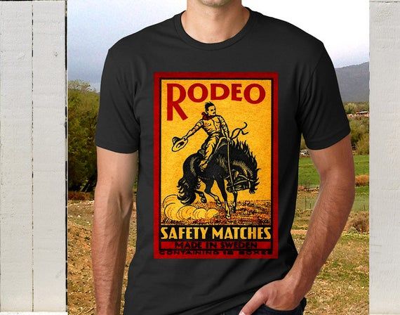 Bucking Cowboy In Bright Red And Yellow Vintage Rodeo Illustration Printed On A T Shirt