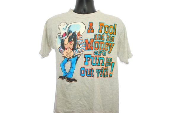 1980 s A Fool and his Money are Fun to go Out with Vintage Sun Sportswear Brand Cult Classic 80 s 90 s Pop Culture Creepy Cowboy T Shirt