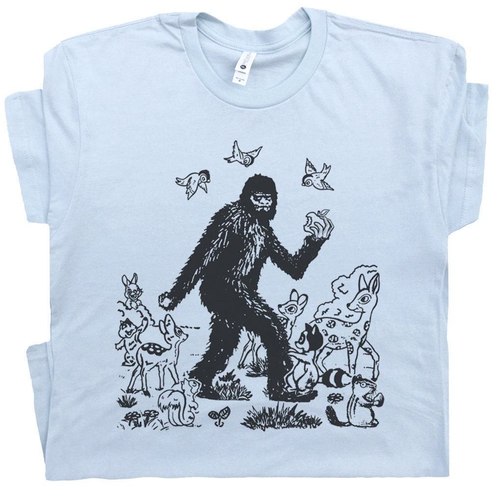 Bigfoot Shirt Cool Bigfoot Raccoon T Shirt Cryptid Shirts for Women Men Funny Sasquatch Graphic Shirt Cryptozoology Weird Unusual Yeti Tee