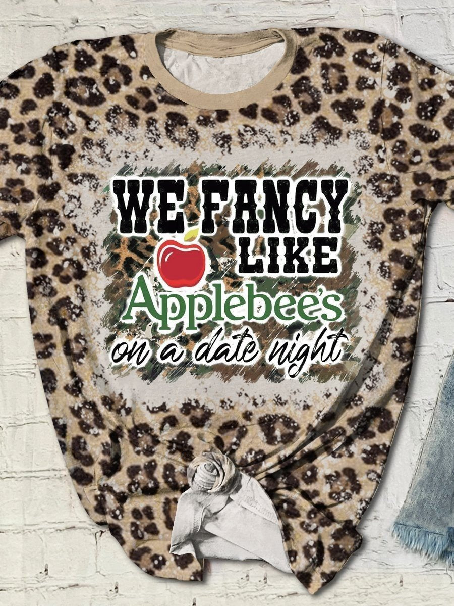 We Fancy Like Applebee’S On A Date Night Country Music Leopard Bleached Print Short Sleeve T-Shirt