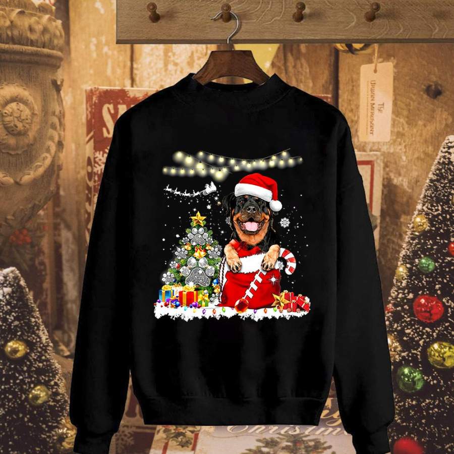 Christmas cute rottweiler merry christmas dog wearing santa hat candy cane paw print dog colorful light dog lovers gift black sweatshirt for men and women S-5XL