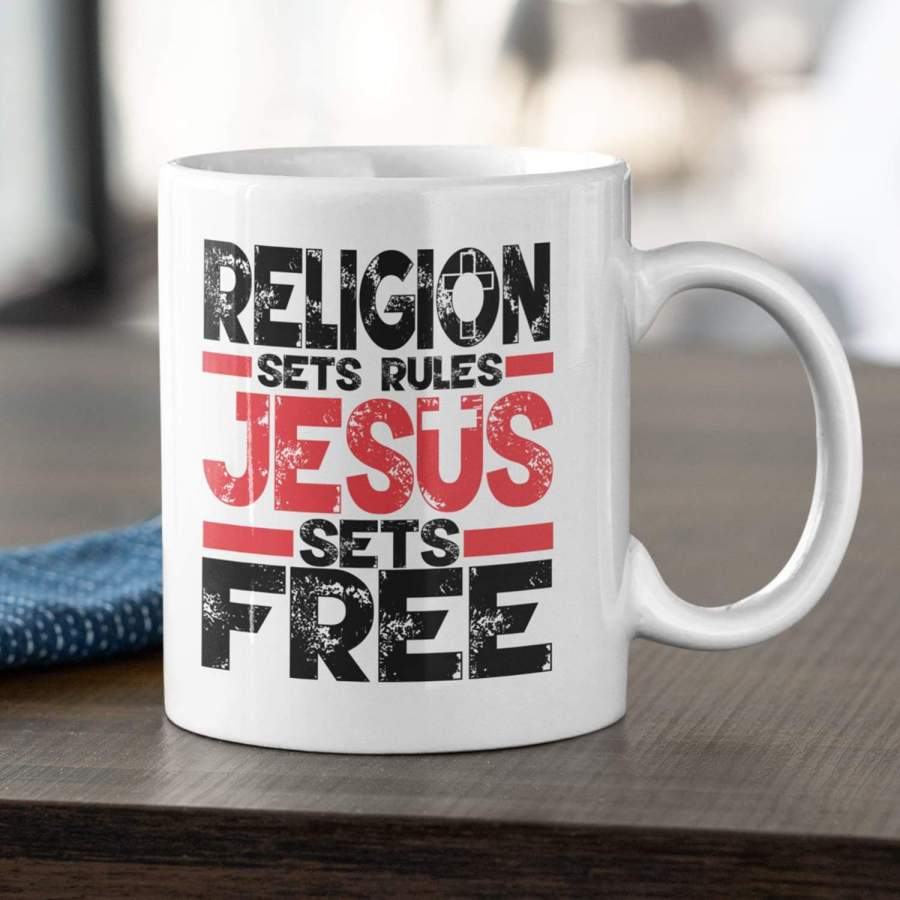 Religion sets rules Jesus sets free coffee mug