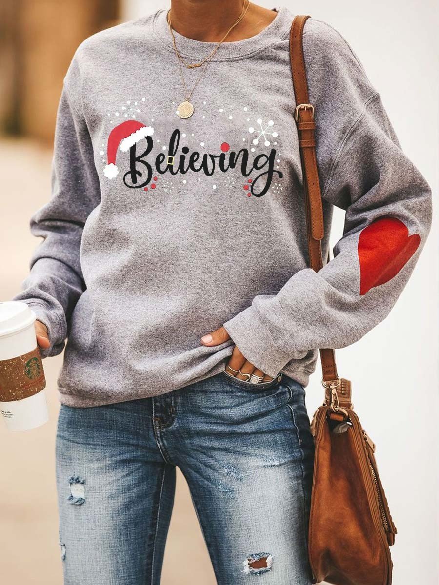 Women’S Merry Christmas Believeing Sweatshirt