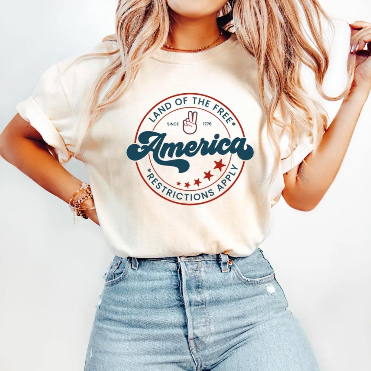 America Land of the Free Restrictions Apply T-Shirt, Progressive Fourth of July Shirt, Feminism Shirt, BLM, LGBTQ, Trans Rights Social Justice Tee
