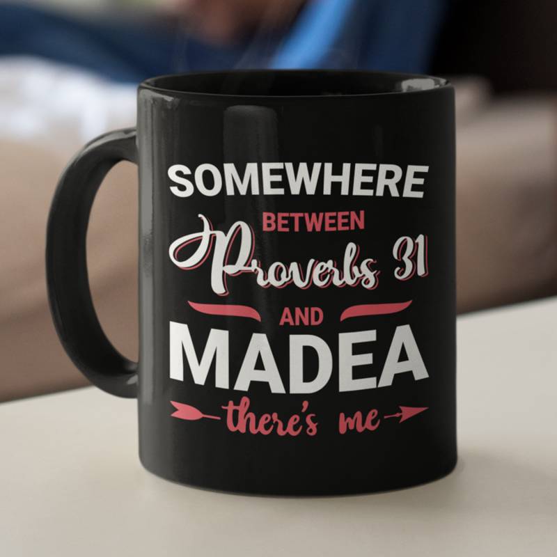 Somewhere Between Proverbs 31 and Madea coffee mug