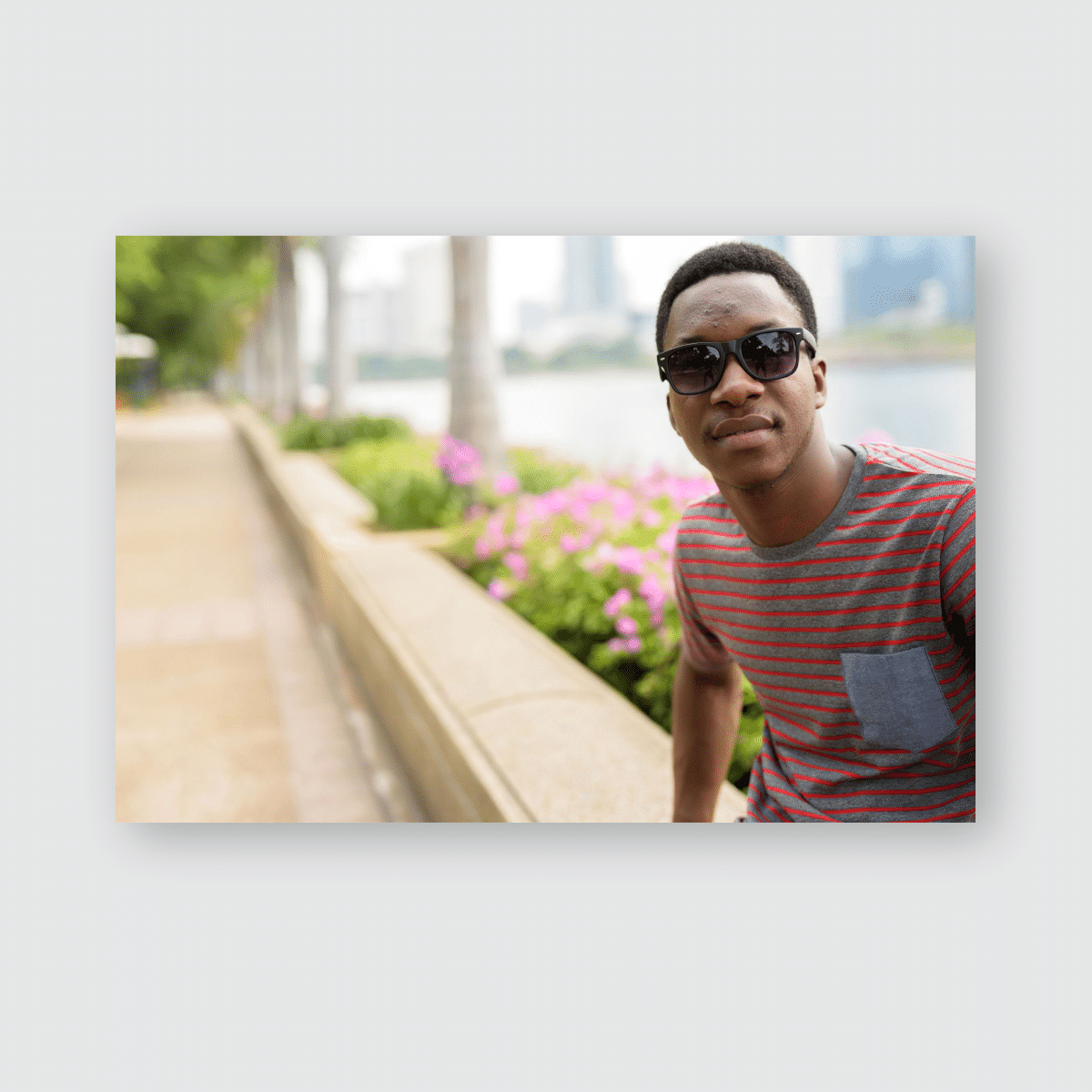 Portrait Young Handsome African Man Relaxing Poster, Pillow Case, Tumbler, Sticker, Ornament