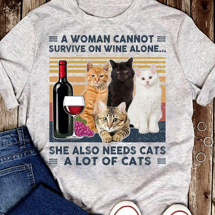 A Woman Cannot Survive One Wine Alone She Also Needs Cats A Lot Of Cats Cotton T-Shirt