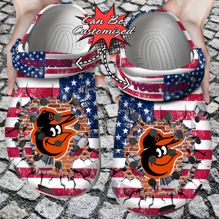 Baseball Crocss – Personalized B.Orioles American Flag Breaking Wall Clog Shoes.Webp