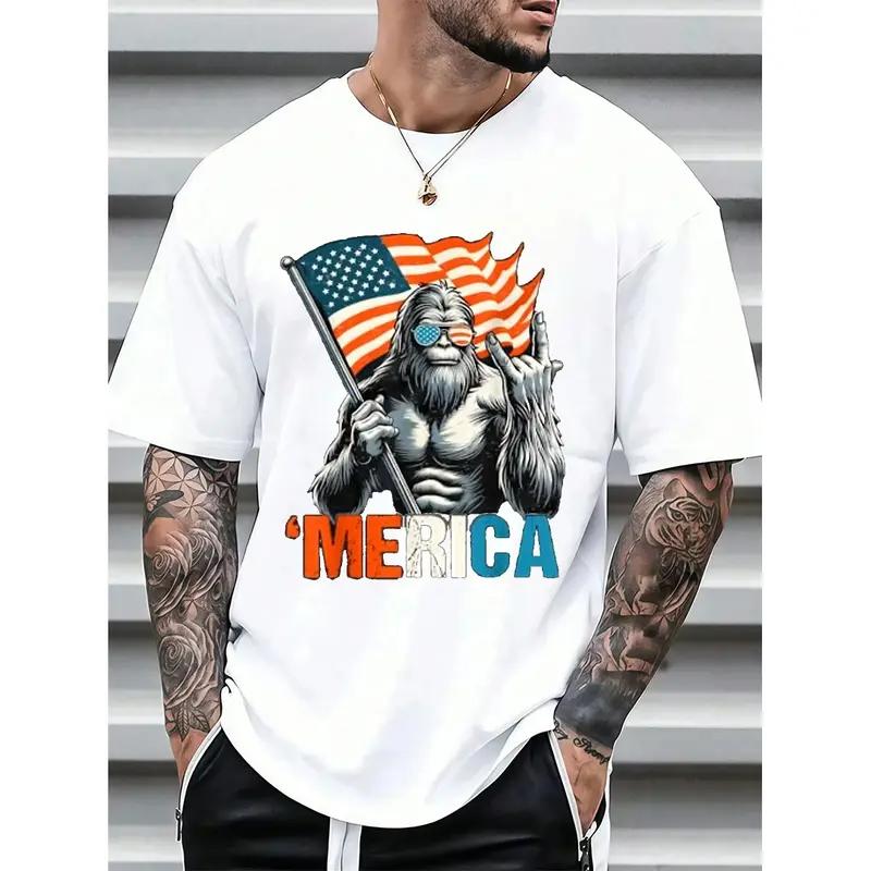 T – Shirt with a Fun Twist: Iconic Bigfoot Figure Holding Flag and Making Hand Gesture with ‘Merica’ for a Light – hearted Patriotic Vibe