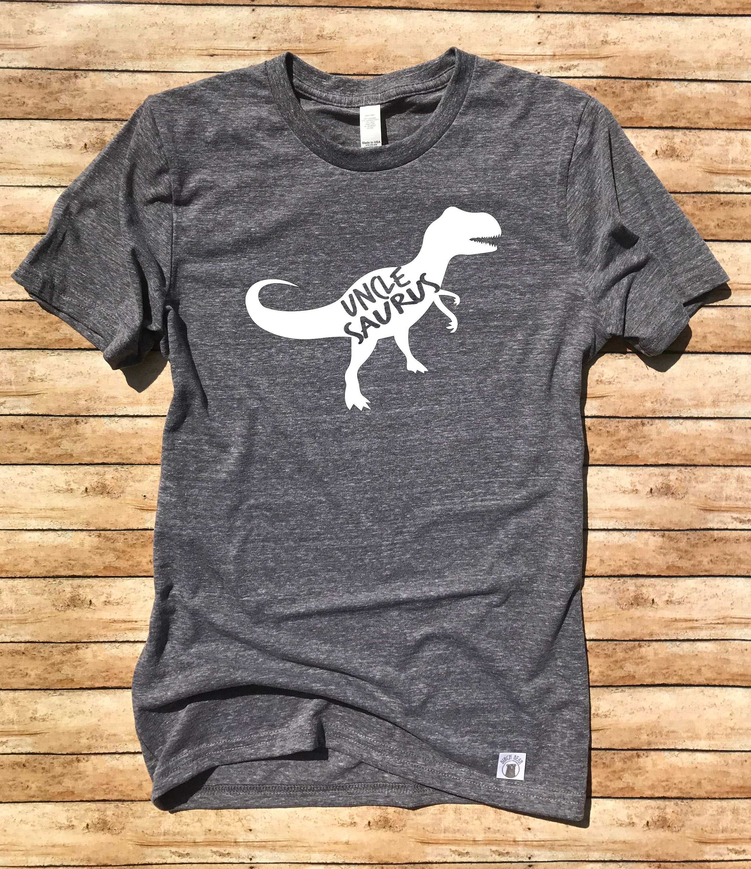 Uncle Saurus Shirt Uncle Shirt – Uncle Gift – Uncle Saurus – Dinosaur Uncle – Shirts For Uncle – Uncle T Shirt Unisex Tri-Blend T-Shirt