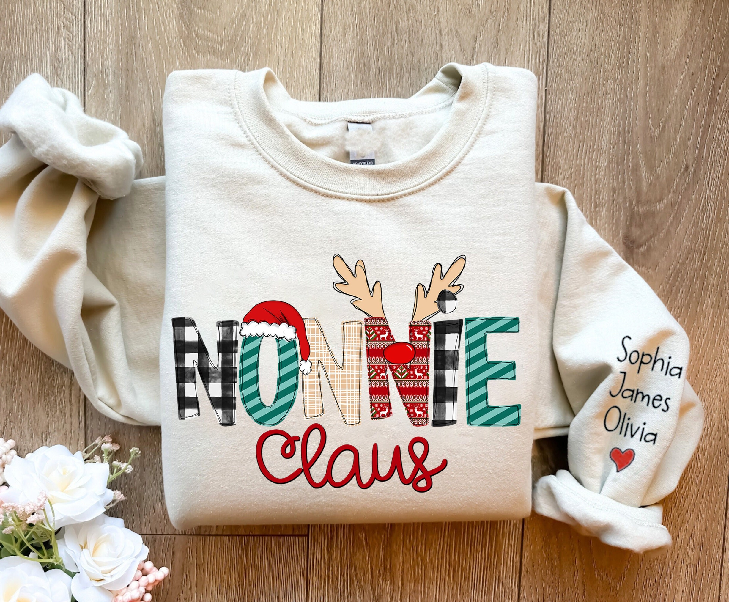 Custom Nonnie Claus Sweatshirt, Christmas Nonnie Claus Sweatshirt, Xmas Nonnie Sweater, Custom Nonnie And Grandkids Sweatshirt