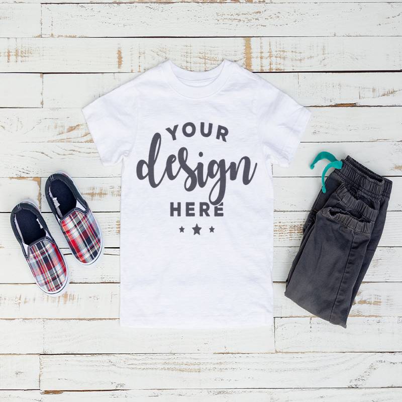 White Kids Tshirt Mockup On Distressed Wood Background With Plaid Shoes and Pants Hi Resolution Jpeg 300 ppi Image flat lay