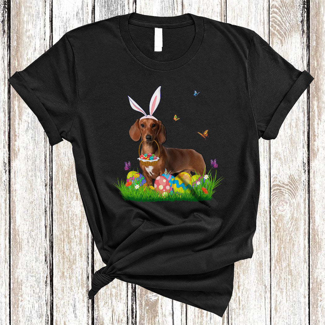 Bunny Dachshund With Easter Egg Basket Cute Easter Butterfly Flower Egg Hunt Dog Lover Gifts T-Shirt