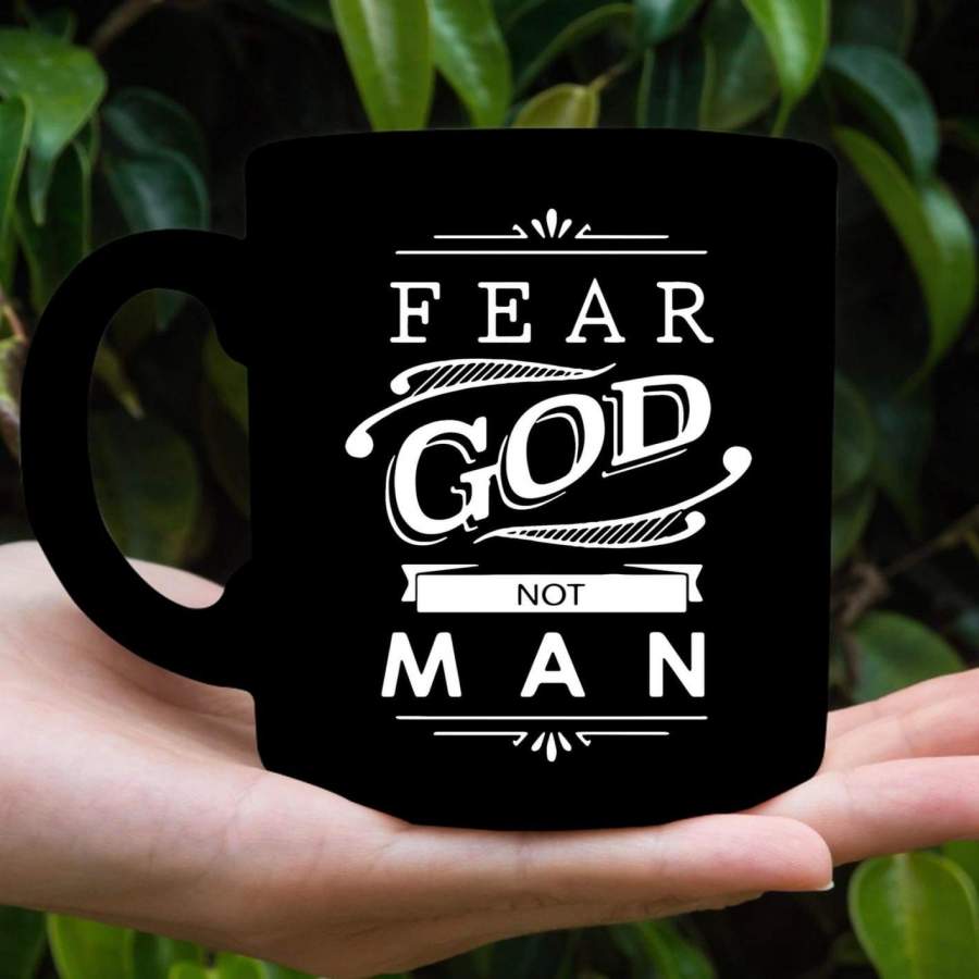 Fear God not man coffee mug