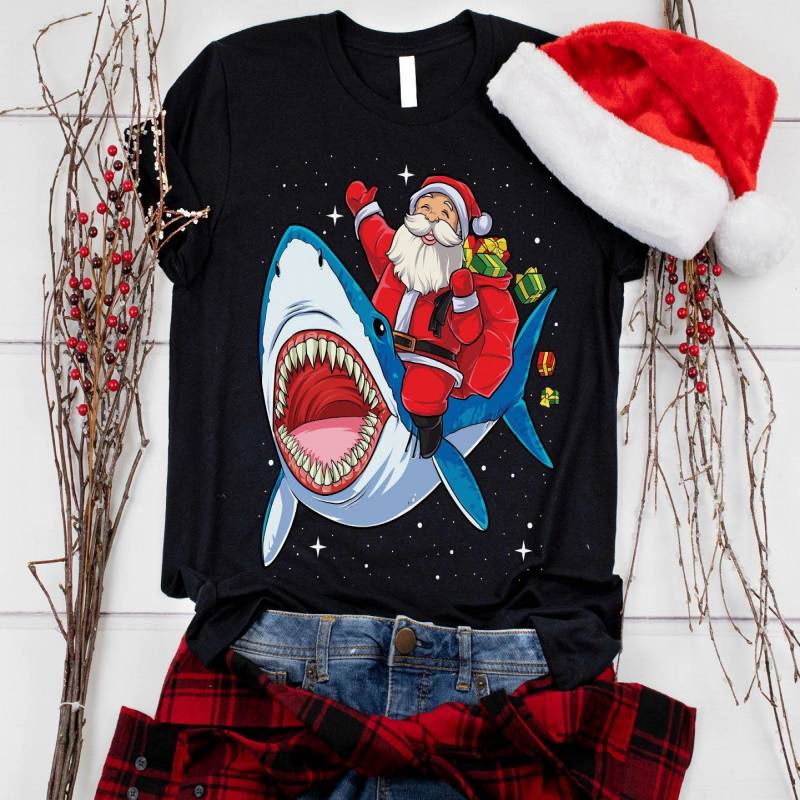 Crushtee Santa Riding Shark Christmas Shirt Xmas Gift Merry Christmas Happy Holidays Santa Claus Family Matching Tank Top Hoodie Long Sleeve Hoodie