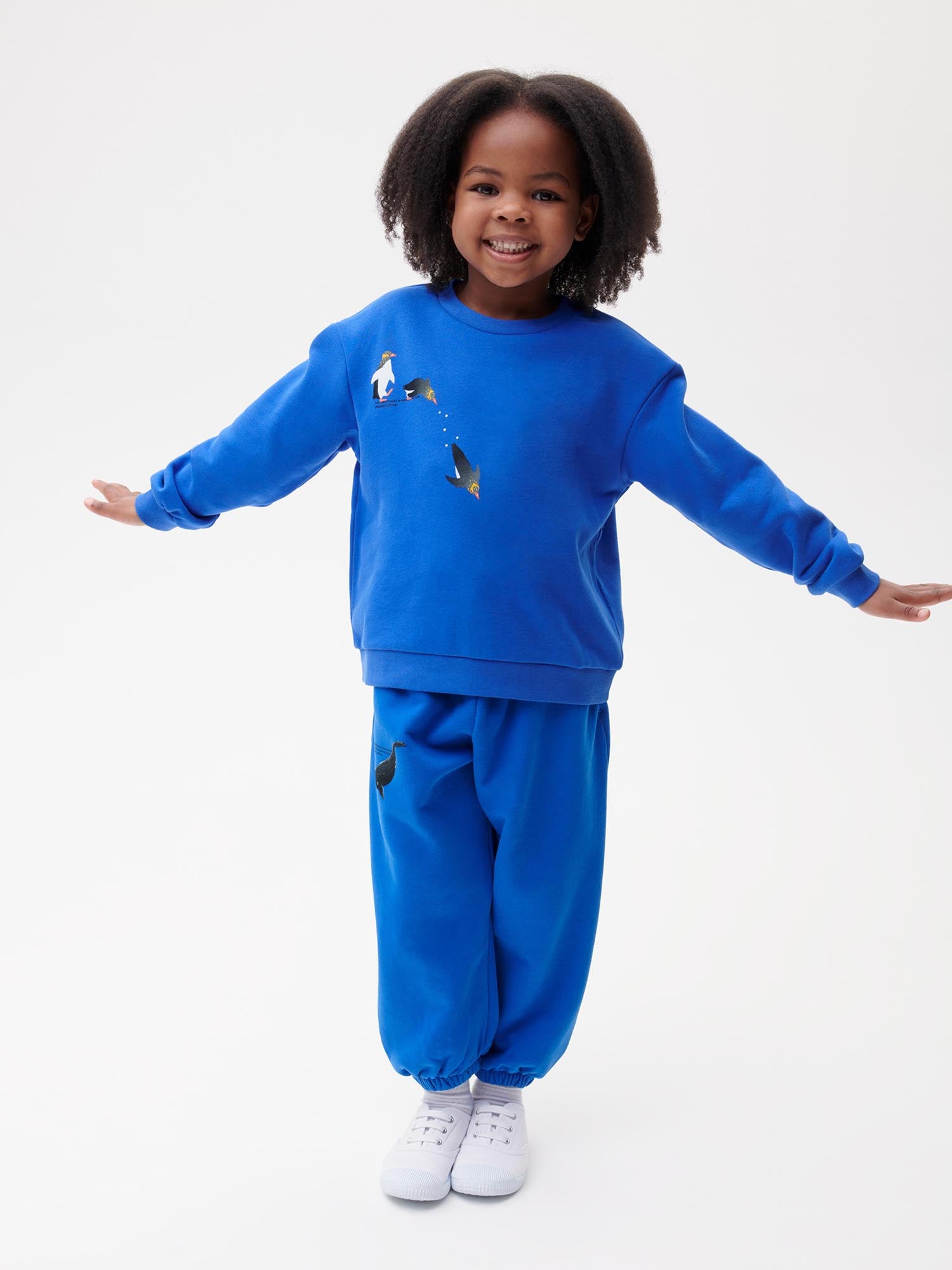 Kid’s WAHP Jumping Yellow Eyed Penguins sweatshirt—cobalt blue