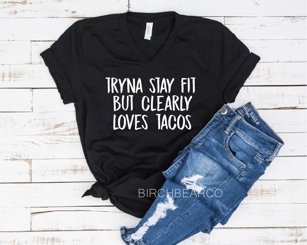 Tryna Stay Fit But Clearly Likes Tacos Shirt – Unisex V Neck