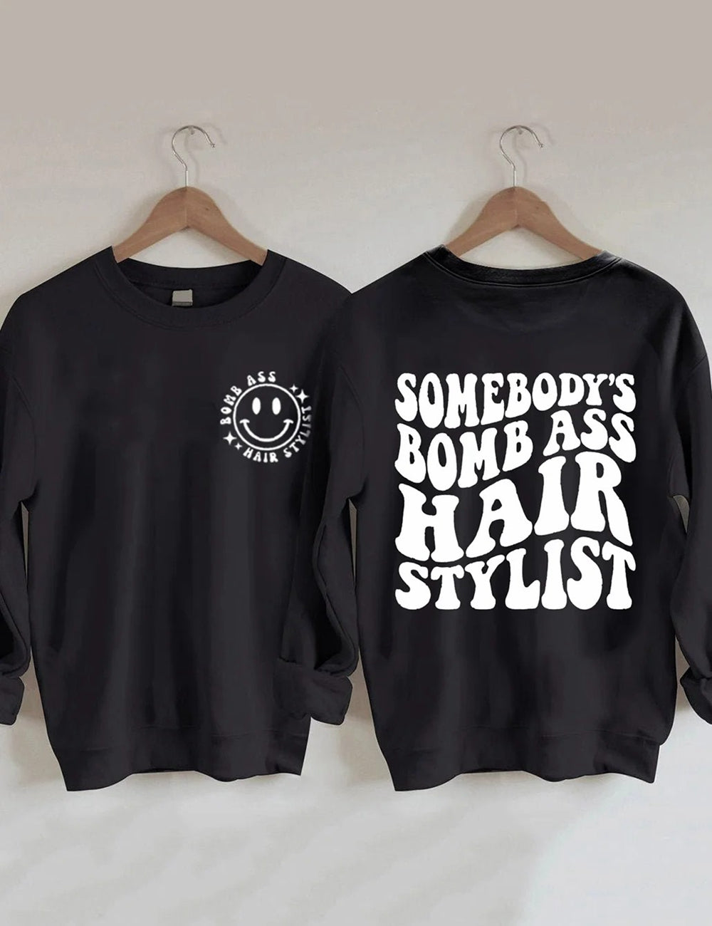 Somebody’S Bomb Ass Hair Stylist Sweatshirt- Black