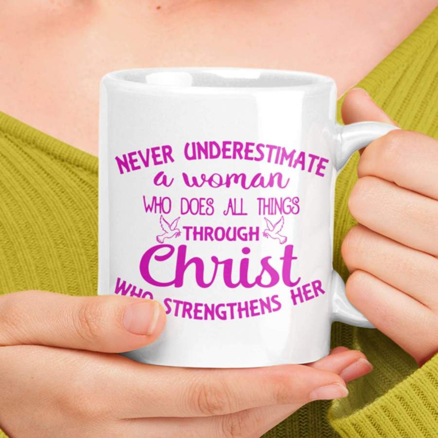 Never underestimate a woman coffee mug