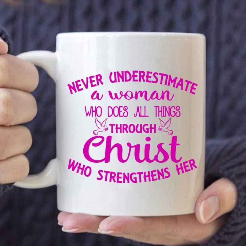 Never underestimate a woman coffee mug